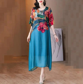 Compra Vestido Elegante con Estampado Floral y llévate 1 bufanda bordada bohemia exclusiva de BlomLane